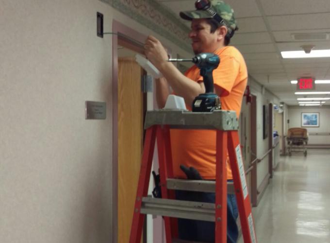 Our Low Voltage Division Installing Nurse Call Systems 